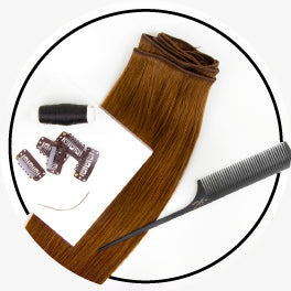 Classic weft extensions laying flat with comb, toupee clips, and nylon thread