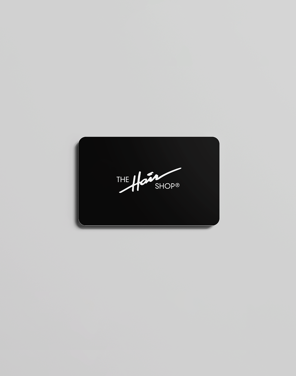 The Hair Shop logo on black background gift card