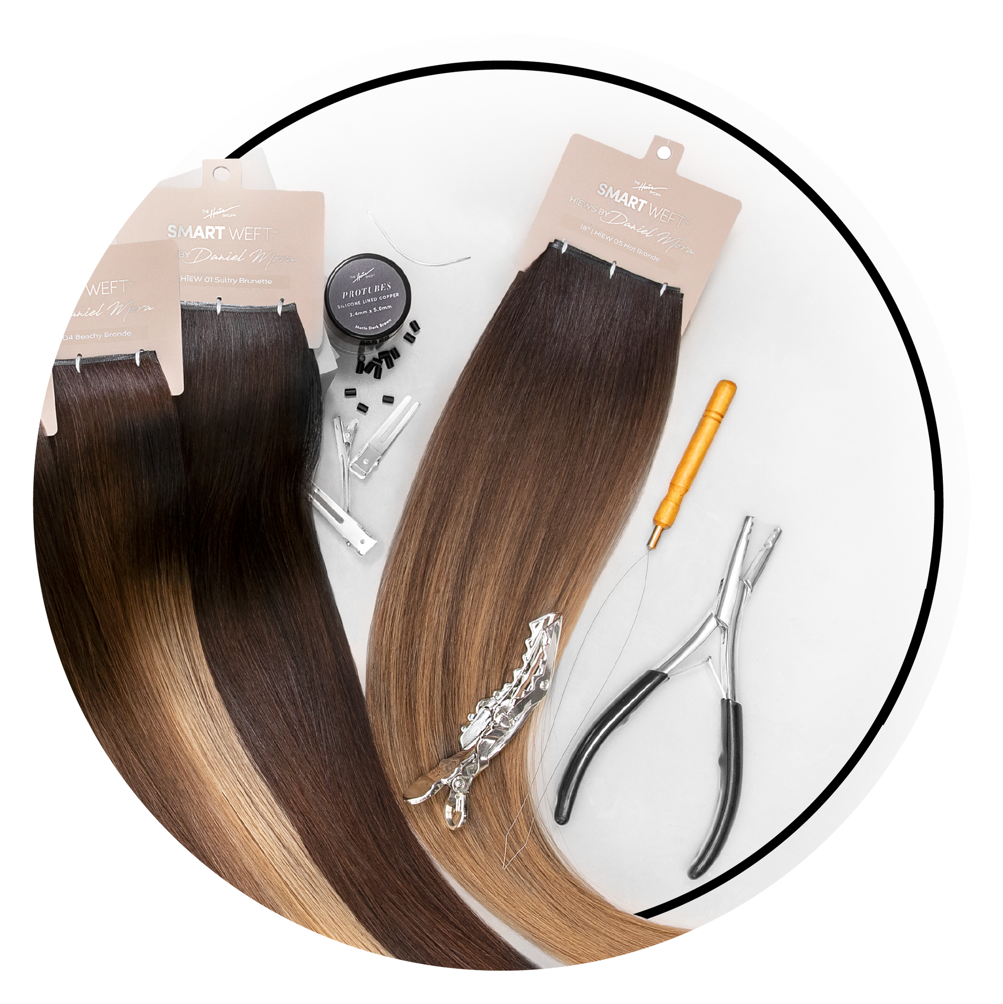 Smart Weft™ extensions laying flat with pro opener, pro loop needle, silicone-lined protubes and metallic shark clips®