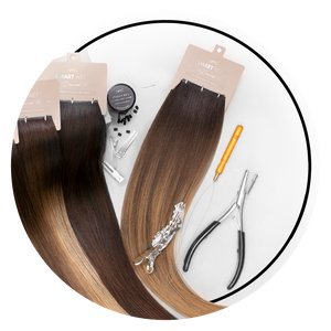 Smart Weft™ extensions laying flat with pro opener, pro loop needle, silicone-lined protubes and metallic shark clips®