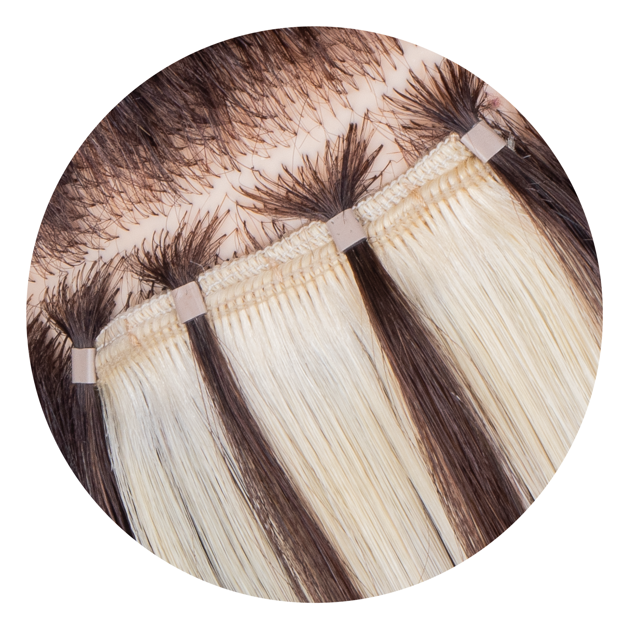 Close-up of One-Step Weft extensions applied on head