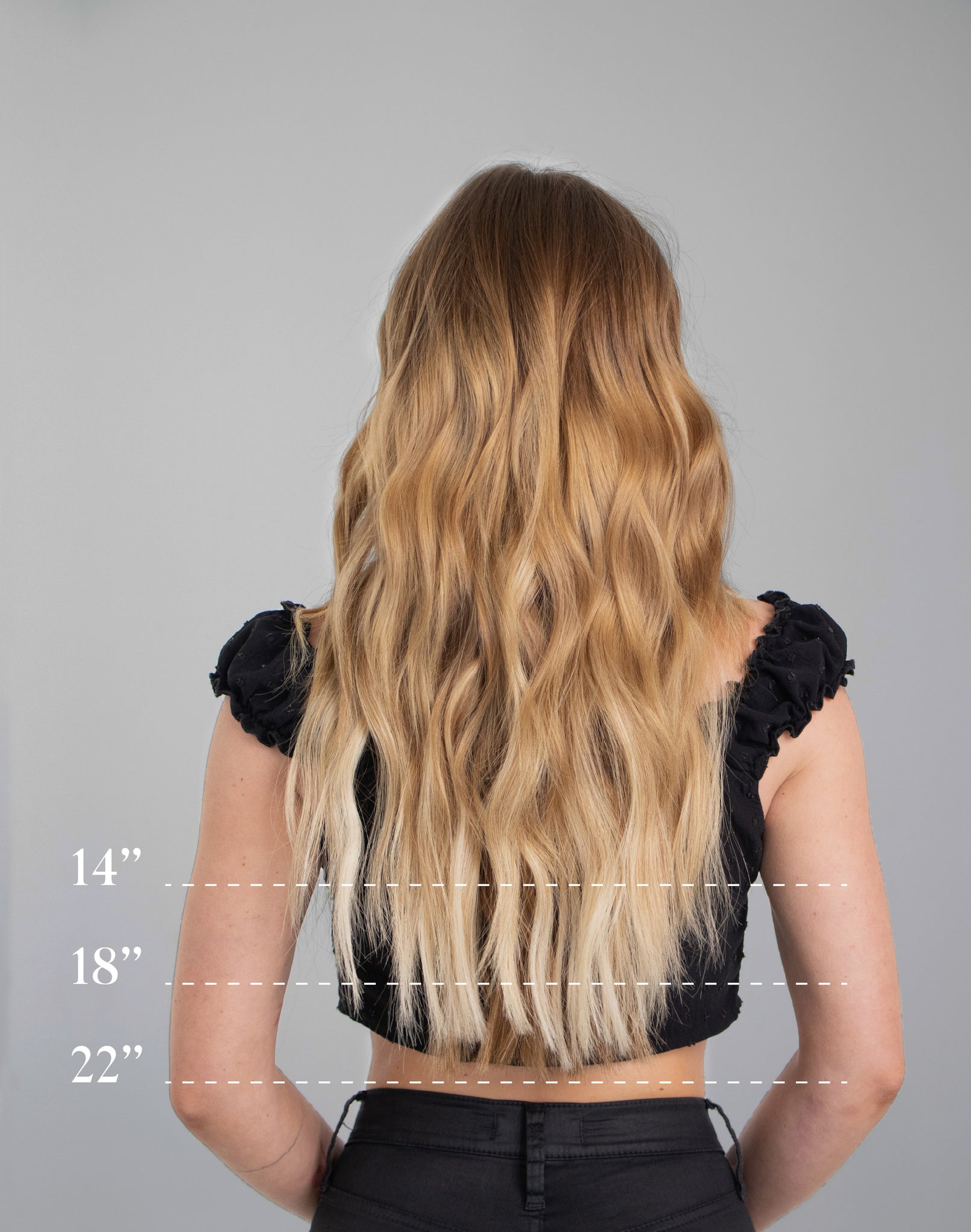 chart showing different lengths of wavy hair on model. 14" hair length falls below armpits, 18" mid-back, 22" hips