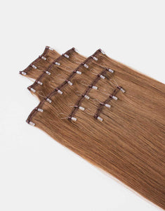 row of one-step-weft brunette extensions