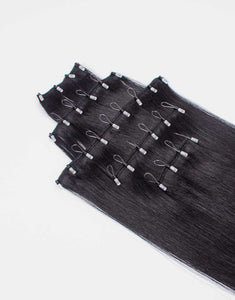row of one-step-weft black extensions