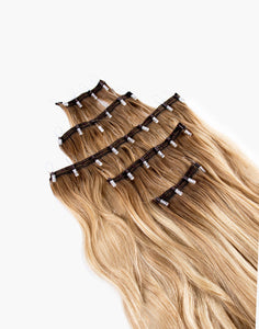 row of one-step-weft dimensional extensions