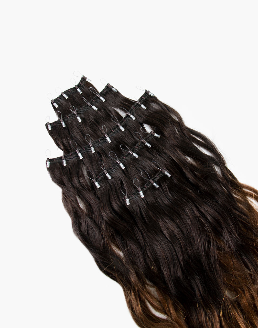 row of one-step-weft dimensional extensions