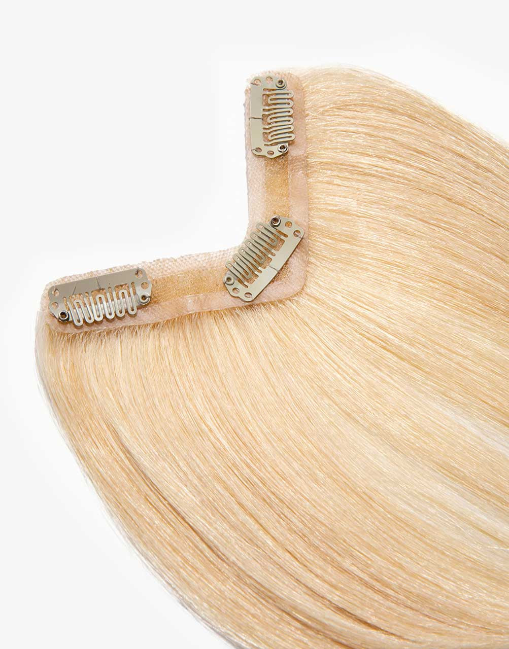close up of v bang clip-in extension in blonde